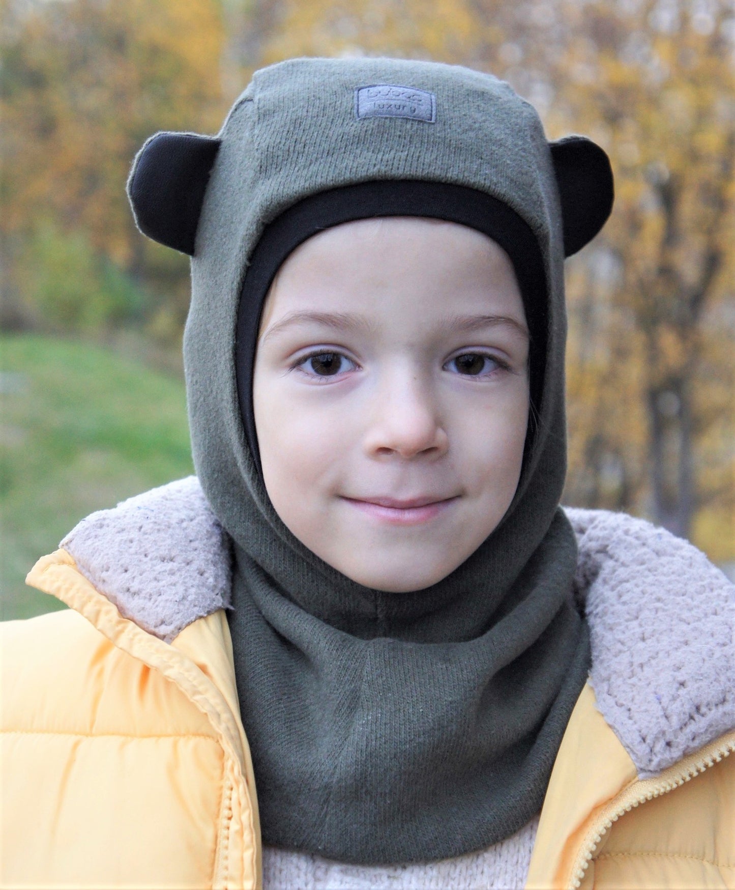 Vaikiška kepurė šalmukas pavasariui / rudeniui / žiemai Bear BUBOO luxury chaki