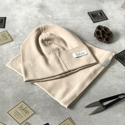 Vaikiška vienguba kepurė TRENDY kreminės spalvos
