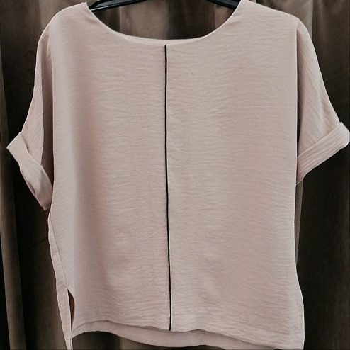 Female stylish summer blouse with short sleeves, cream